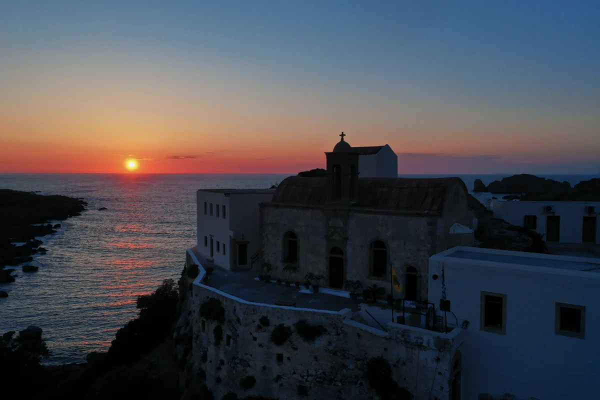 Chrysoskalitissa monastery chapel cross sunset sea view Crete
