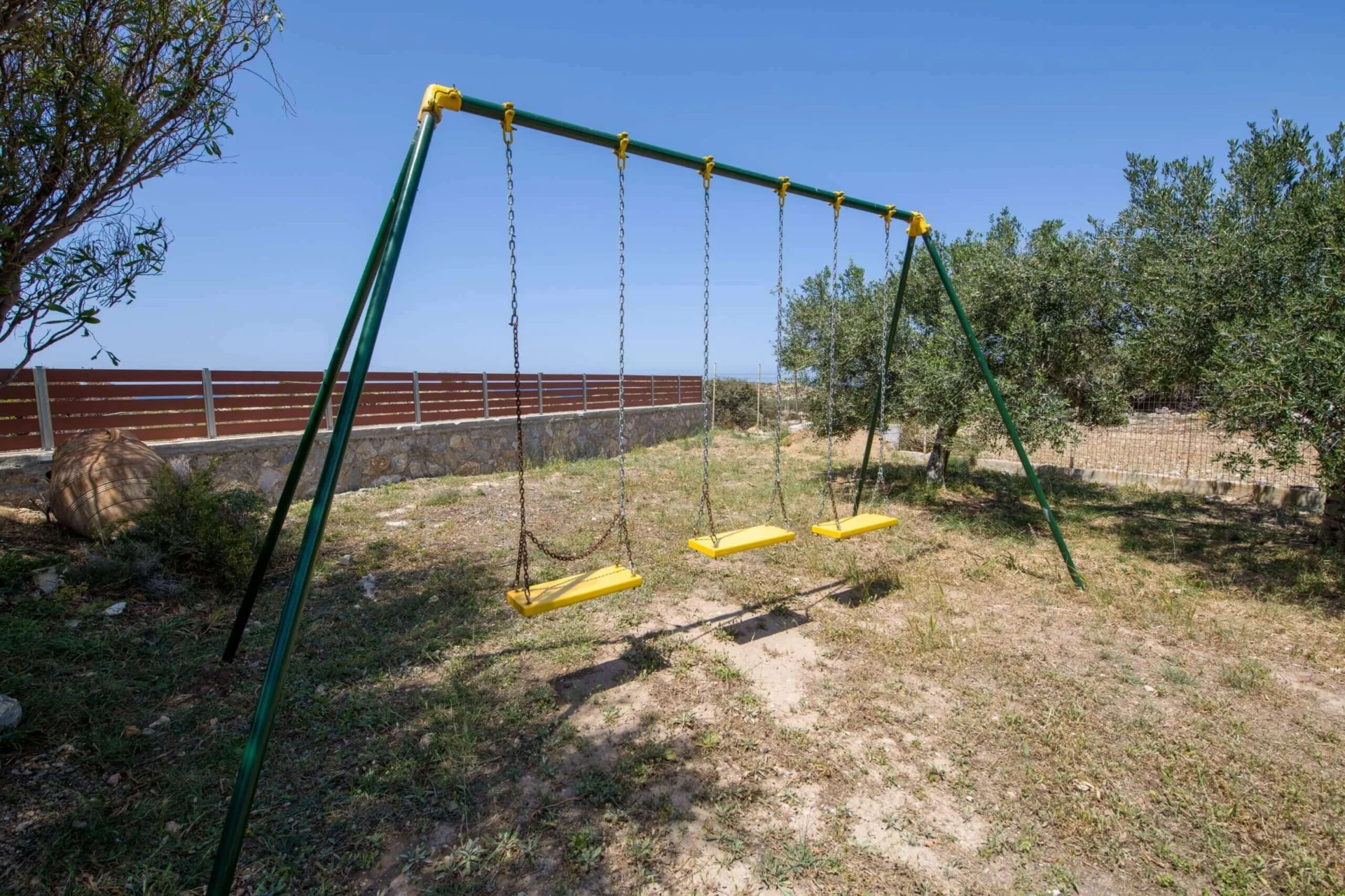 Villa Ciel garden swing set tree shade