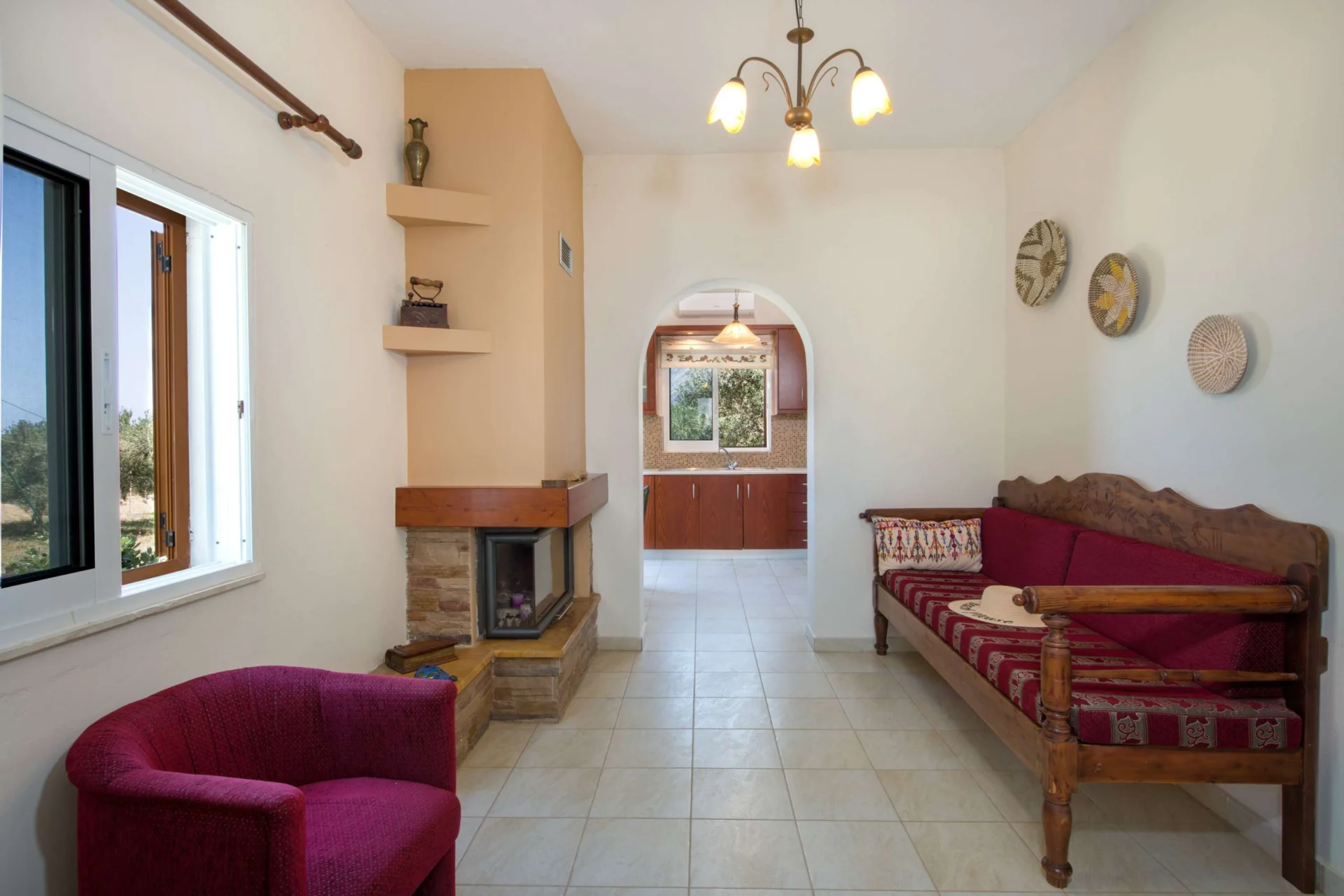 Villa Ciel living room arch doorway shelves